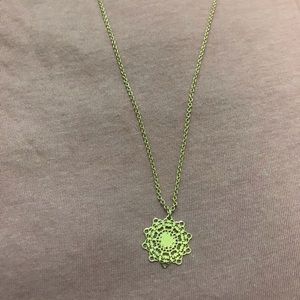 Gold medallion pendent necklace
